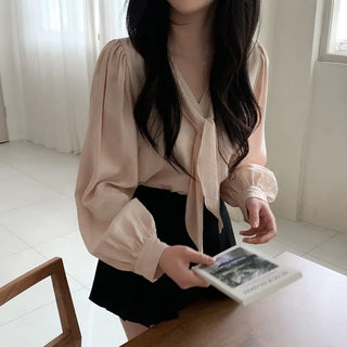 Tie-detail ribbon puff sleeve V-neck blouse