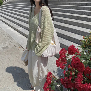 Off-shoulder oversized sheer V-neck
