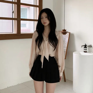 Tie-detail ribbon puff sleeve V-neck blouse