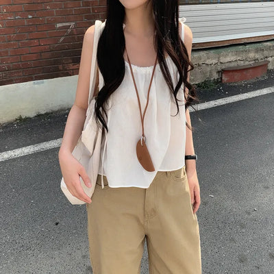 Layered oversized strap sleeveless shirred blouse