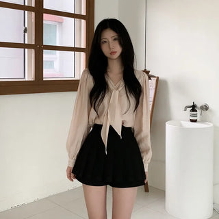 Tie-detail ribbon puff sleeve V-neck blouse