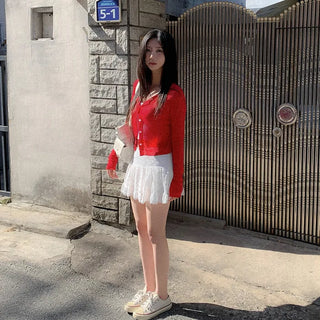 (Includes inner shorts) Low-rise lace tiered mini skirt