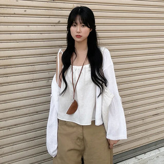 Layered oversized strap sleeveless shirred blouse