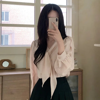 Tie-detail ribbon puff sleeve V-neck blouse