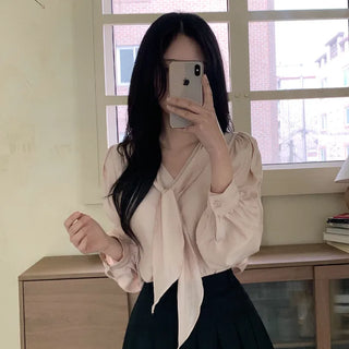 Tie-detail ribbon puff sleeve V-neck blouse