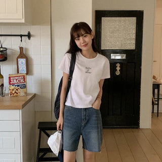 Cotton denim shorts with cut hems