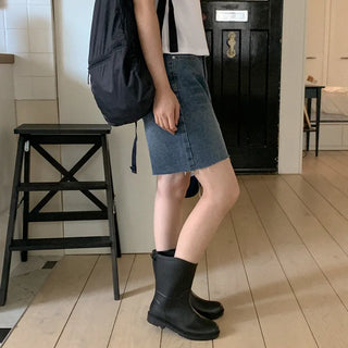 Cotton denim shorts with cut hems