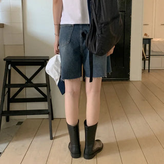 Cotton denim shorts with cut hems
