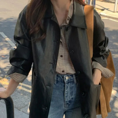 Loose-fitting black half-leather jacket