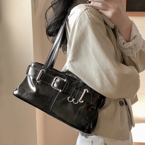 Belted glossy leather shoulder bag