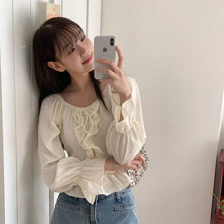 Frilled off-shoulder blouse