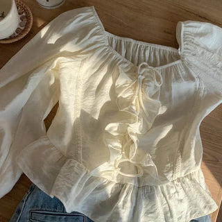 Frilled off-shoulder blouse