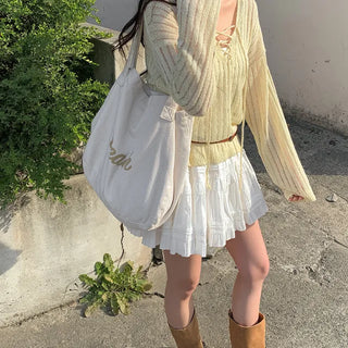 Ribbed V-neck sheer loose fit knit
