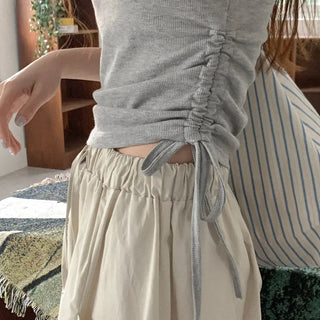 Sleeveless top with shirred bra cups