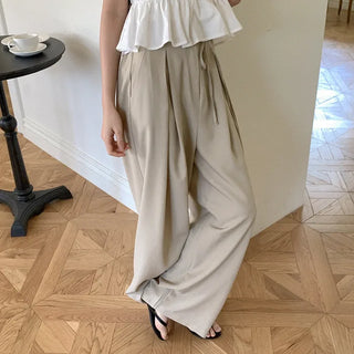 Banding pleated wide slacks with ribbon