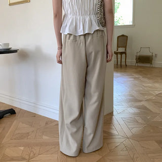 Banding pleated wide slacks with ribbon