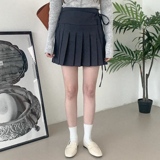 Pleated ribbon mini skirt