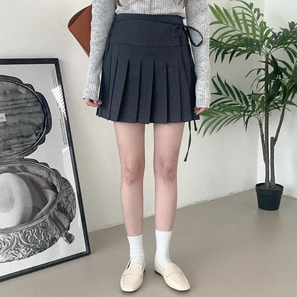 Pleated ribbon mini skirt