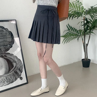 Pleated ribbon mini skirt