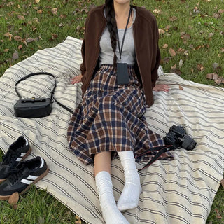 High-waisted elastic long flared check skirt