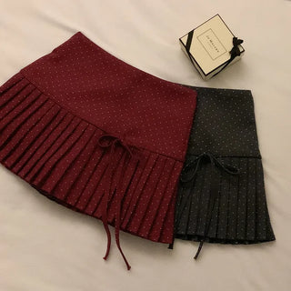 Polka dot ribbon pleated mini skirt