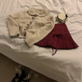 Polka dot ribbon pleated mini skirt