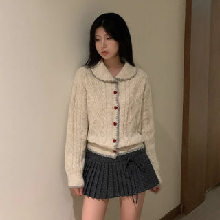 Polka dot ribbon pleated mini skirt