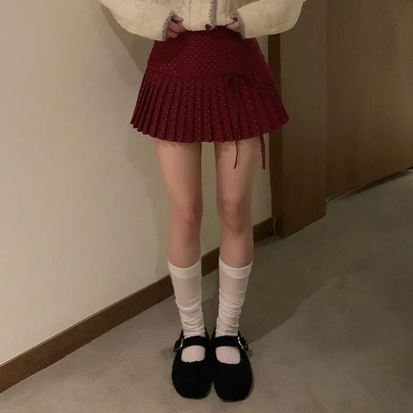 Polka dot ribbon pleated mini skirt
