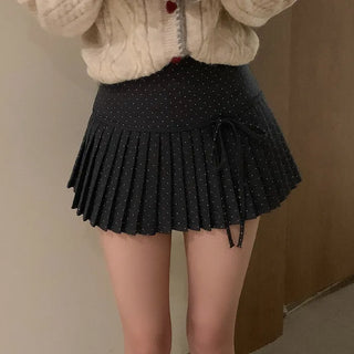 Polka dot ribbon pleated mini skirt