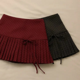 Polka dot ribbon pleated mini skirt