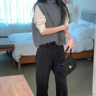 Asymmetrical high-neck vest