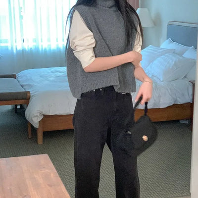 Asymmetrical high-neck vest