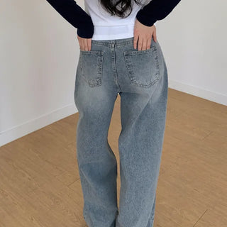 Pleated wide-leg denim pants