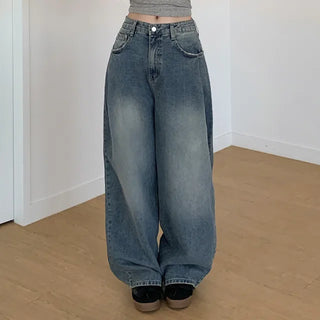 Pleated wide-leg denim pants