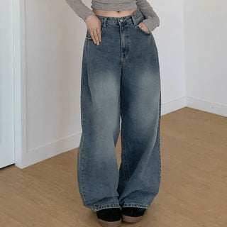 Pleated wide-leg denim pants