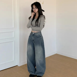 Pleated wide-leg denim pants