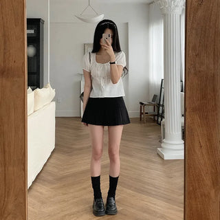 Pleated mini skirt