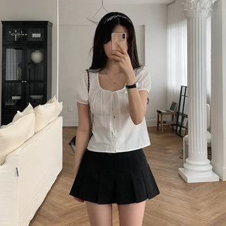 Pleated mini skirt