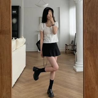 Pleated mini skirt