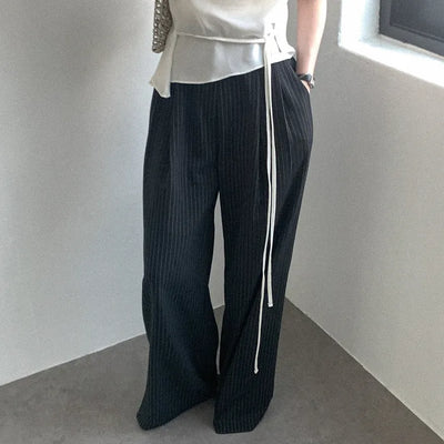 Striped pleated slacks