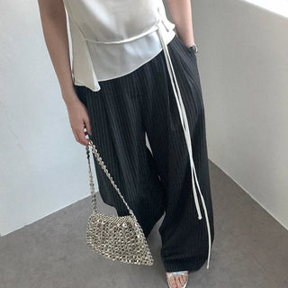 Striped pleated slacks