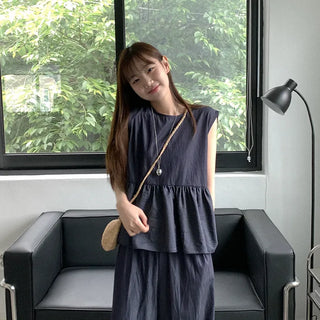 Flared sleeveless blouse