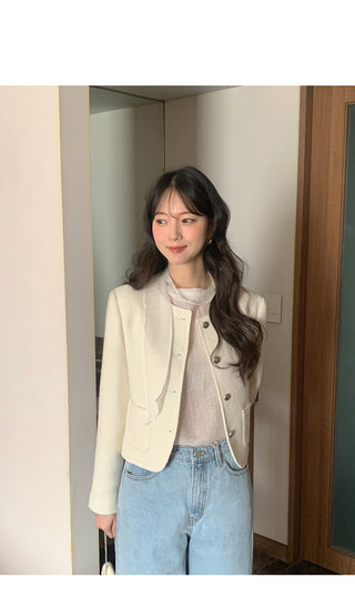 Collarless tweed jacket