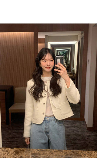 Collarless tweed jacket