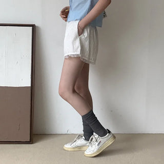 Perforated frill shorts