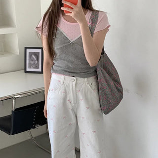 Ribbon strap eyelet punched sleeveless top