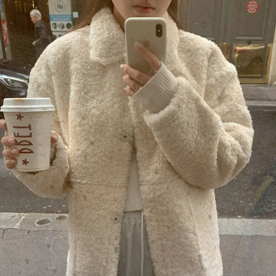 Loose-fitting boa collar shearling coat