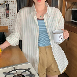 Loose-fit cotton striped shirt (2c)