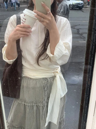 Ribbon long-sleeved blouse