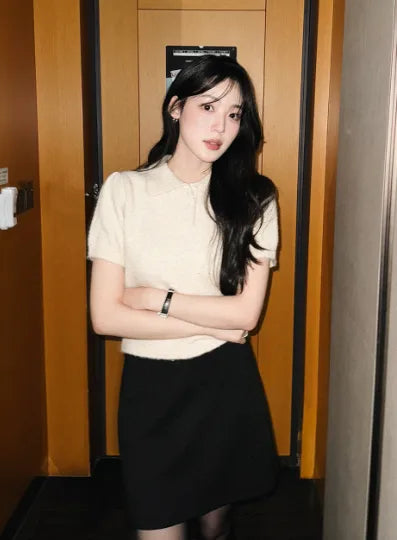 Puff-sleeved, collared knit top